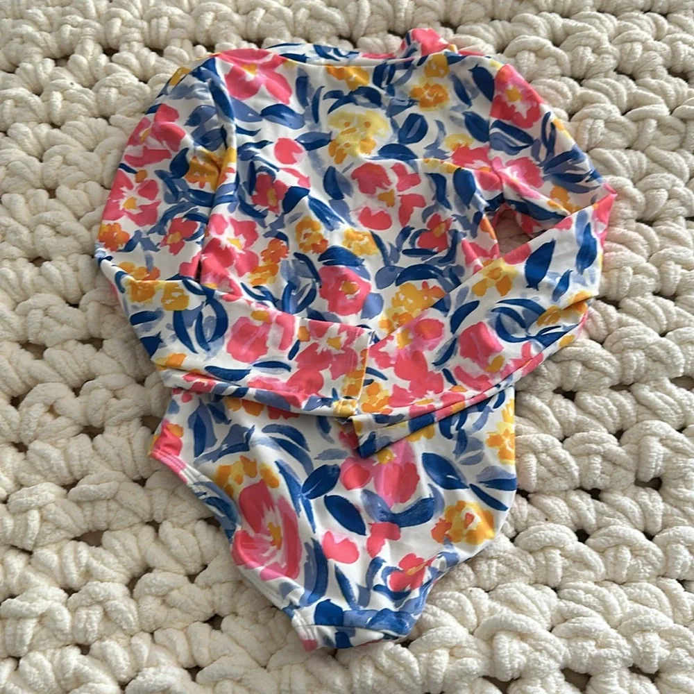 Carters one-piece rashguard swimsuit.